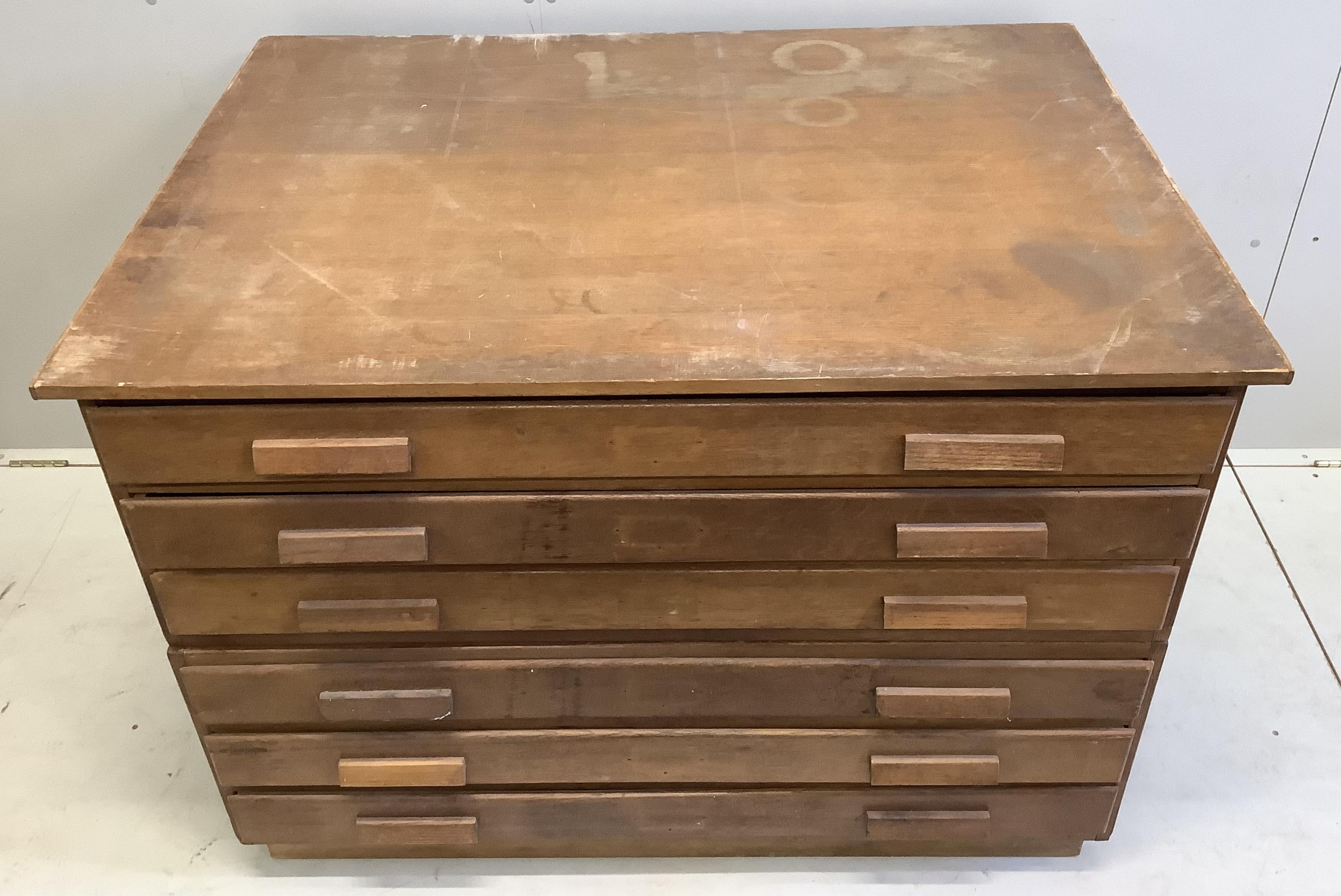 A mid century oak plan chest, width 120cm, depth 88cm, height 86cm